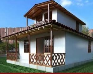 Casa blanca de dos pisos y balcón